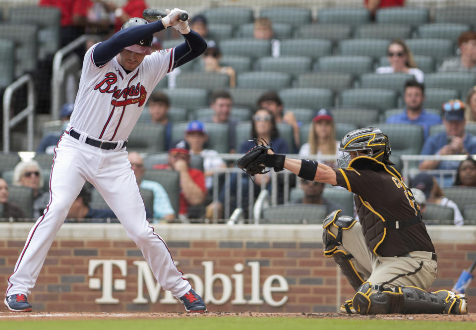 Atlanta Braves' Freddie Freeman avoids a pitch during the first inning of the second baseball game of a doubleheader against the San Diego Padres on Wednesday, July 21, 2021, in Atlanta. (AP Photo/Hakim Wright Sr.)