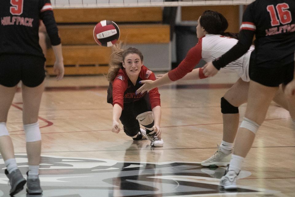 Evangelical Christian School libero Sierra Sharp dives for the ball in their game against South Fort Myers on Thursday, October 13, 2022, at South Fort Myers High School. It was the first volleyball match for both schools since Hurricane Ian.