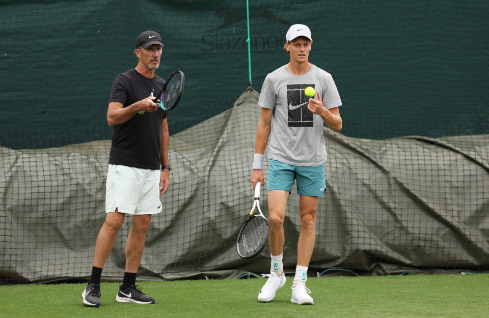 Darren Cahill and Jannik Sinner during a practice session.