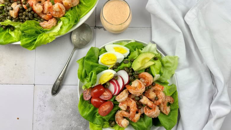 shrimp louie salad with eggs and avocado