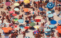 To this day, Ipanema Beach (shot here in the late 1980s) remains a popular destination for sunbathers and people-watchers.