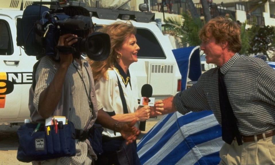 <span><span>Michelle Pfeiffer and Robert Redford in <em>Up Close & Personal</em></span><span>Frank Trapper/Corbis/Getty</span></span>