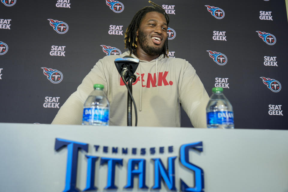 Tennessee Titans tackle JC Latham responds to questions during a news conference after an NFL football practice Thursday, June 6, 2024, in Nashville, Tenn. (AP Photo/George Walker IV)