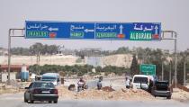 <p>Vehicles try to cross a highway leading to Manbij, in Aleppo Governorate, Syria, Aug. 7, 2016. (REUTERS/Rodi Said) </p>