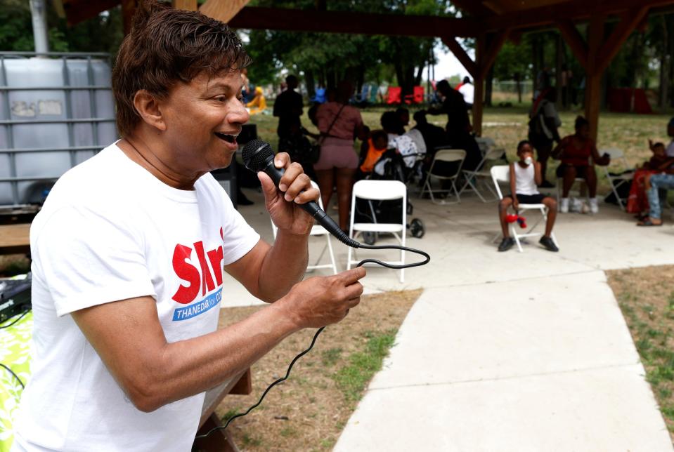 State Rep. Shri Thanedar, representing the third district, talks to the crowed gathered at the Cass Community Social Services Taylor Park in Detroit on Thursday, July 28, 2022. The social service agency hosted a "Get Out the Vote" community day along with giving out free haircuts to kids