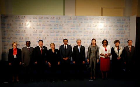 Robert Mugabe, second left, and President of the WHO Dr Tedros Adhanom Ghebreyesus, fifth from left, post at a conference on non communicable diseases.  - Credit: REUTERS/ANDRES STAPFF