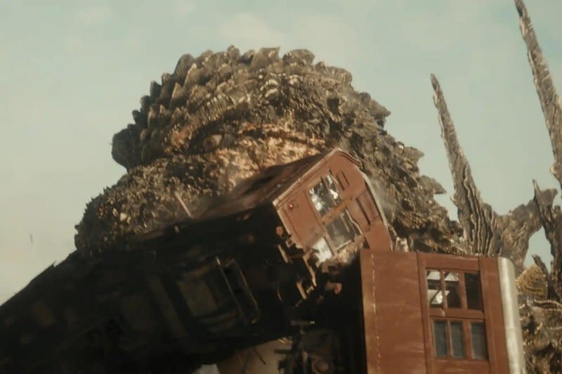 Godzilla takes a bite out of a train in "Godzilla Minus One." Photo courtesy of Toho