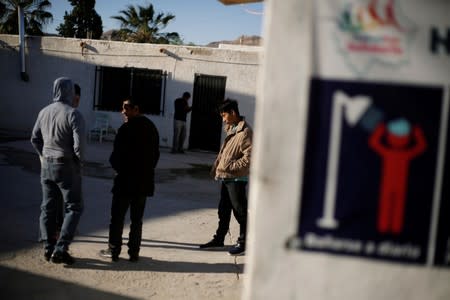 Guatemalan migrants, who are waiting for their court hearing for asylum seekers that returned to Mexico to await their legal proceedings under a new policy established by the U.S. government, are seen at a migrant shelter in Ciudad Juarez