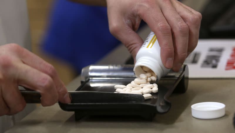 A pharmacist fills a prescription at Intermountain Healthcare’s Salt Lake Clinic in Salt Lake City on Wednesday, Feb. 20, 2019.