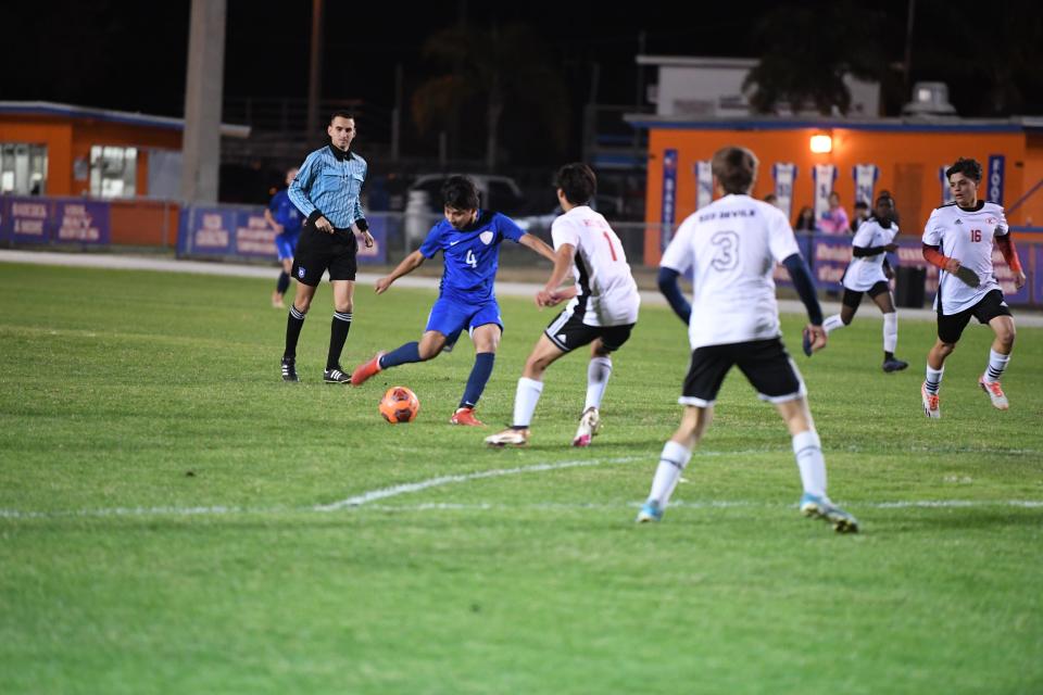 Bartow's Adolfo Perez attempts to kick before scoring a goal in a soccer quarterfinal game. Bartow won 8-0 over Kathleen.