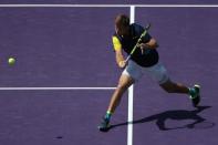 Mar 21, 2018; Key Biscayne, FL, USA; Ryan Harrison of the United States hits a volley against Joao Sousa (not pictured) of on day two of the Miami Open at Tennis Center at Crandon Park. Sousa won 7-6(4), 7-6(4). Geoff Burke-USA TODAY Sports