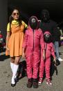 <p>Dressing up as the giant creepy doll, Young-hee, from <em>Squid Games</em> is an easy DIY option — all you need is an orange dress, yellow short and white knee socks. Convince your kids to dress up alongside you.</p>