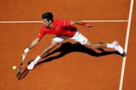 Tennis - Madrid Open - Novak Djokovic of Serbia v Borna Coric of Croatia - Madrid, Spain - 4/5/16 Djokovic returns the ball. REUTERS/Susana Vera