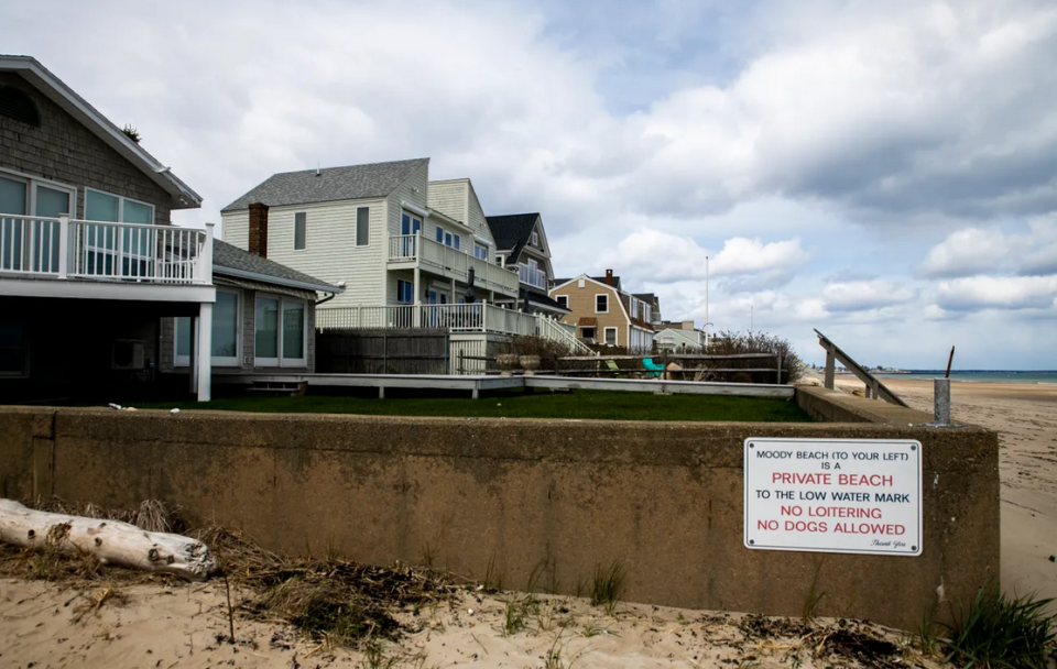 A sign at the boundary between North Beach in Ogunquit and Moody Beach in Wells, shown here in September 2017, advises beachgoers that Moody Beach is private "to the low water mark."