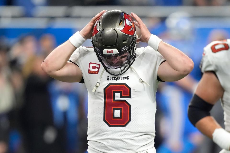 Tampa Bay Buccaneers quarterback Baker Mayfield (6) walks to the bench after his fourth-quarter pass was intercepted by the Detroit Lions on Sunday in Detroit.
