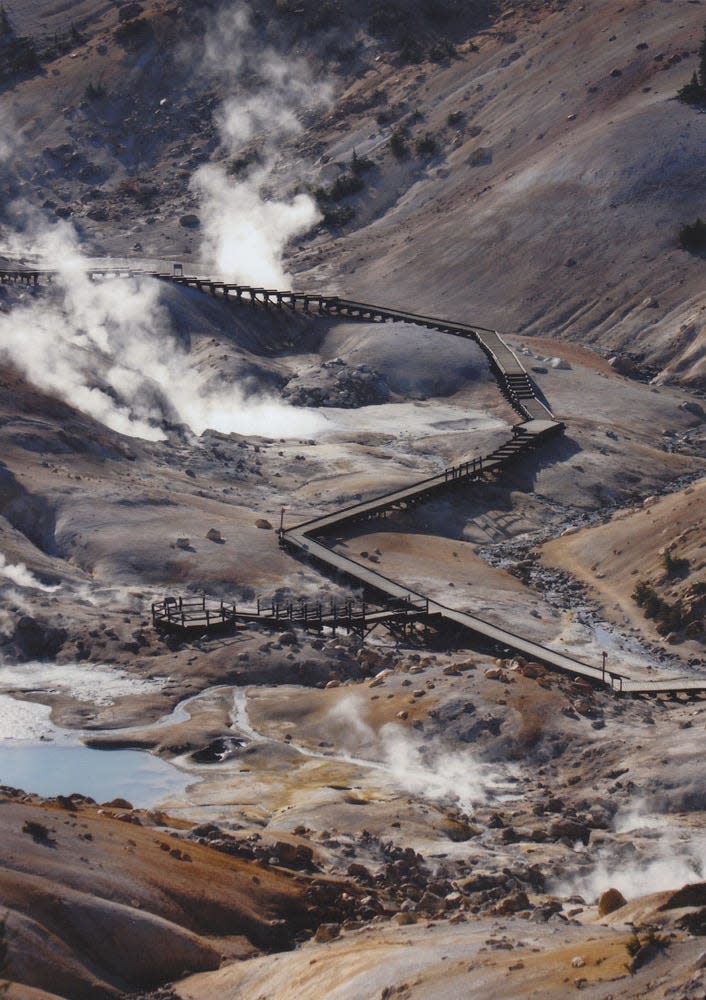 Steam clouds rise up from fumaroles at Lassen Volcanic National Park's Bumpass Hell.