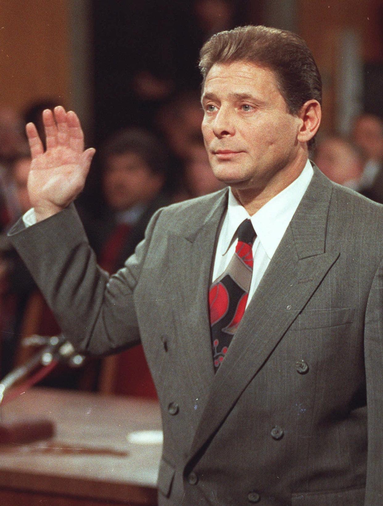 Sammy "The Bull'' Gravano, being sworn in in 1993, helped put his former boss John Gotti away.