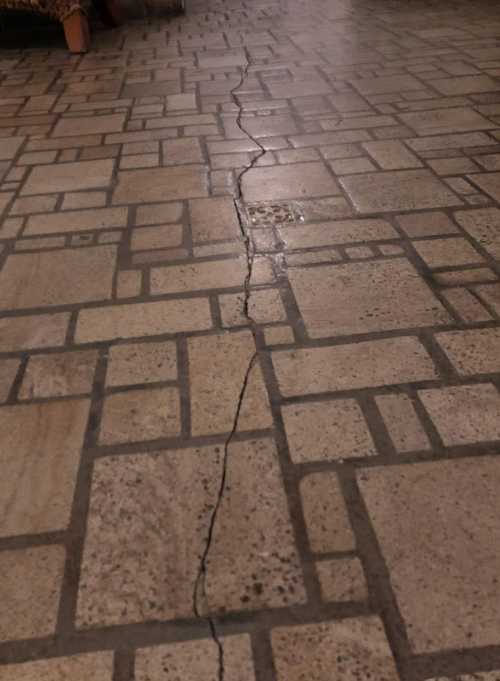 Cracks on the floor of the lobby of the Santander building in Asbury Park.