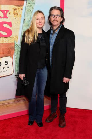 <p>Cindy Ord/Getty</p> Hope Davis and Jon Patrick Walker