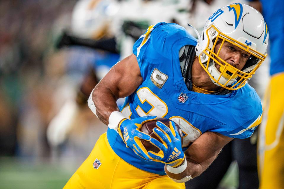 Los Angeles Chargers running back Austin Ekeler (30) runs the ball during an NFL football game against the New York Jets on Monday, Nov. 06, 2023, in East Rutherford, N.J.