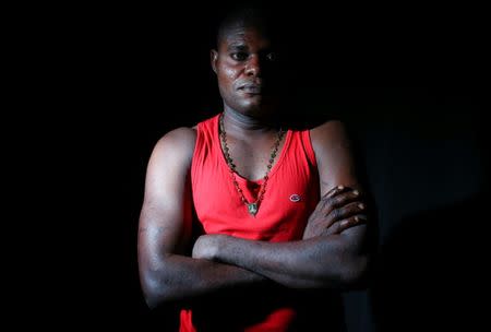 Nigerian Charles Otokiti, 37, who was rescued at sea after passing through Libya in 2016, is pictured in Rome, Italy, July 3, 2018. Picture taken July 3, 2018. REUTERS/Alessandro Bianchi