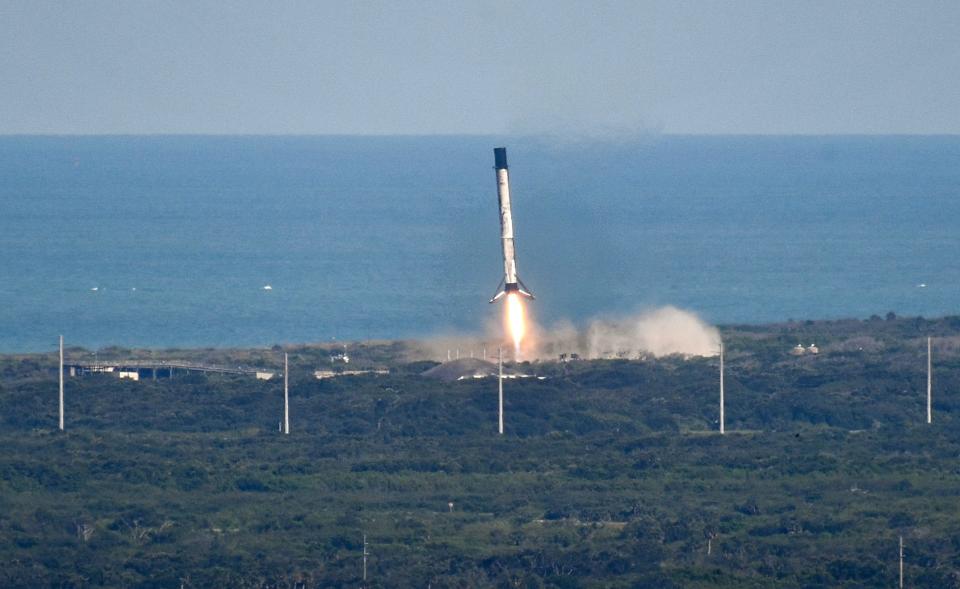 A Falcon 9 booster comes in for landing at LZ-1 Sunday, May 21, 2023 after launching Axiom-2, the second all-private crewed mission to the International Space Station. Mandatory Credit: Craig Bailey/FLORIDA TODAY via USA TODAY NETWORK