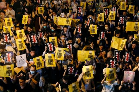 Anti-extradition bill protesters attend a rally calling on the British and U.S. governments to monitor the implementation of "one country two systems" principal, in Hong Kong