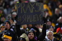 <p>A Baltimore Ravens fan holds up a sign honoring Ryan Shazier #50 of the Pittsburgh Steelers who was injured in a game last week during the game at Heinz Field on December 10, 2017 in Pittsburgh, Pennsylvania. (Photo by Joe Sargent/Getty Images) </p>