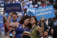 <p>Emotional supporters of former Democratic U.S. presidential candidate Senator Bernie Sanders listen as he speaks during the first session at the Democratic National Convention in Philadelphia on July 25, 2016. (REUTERS/Jim Young)</p>