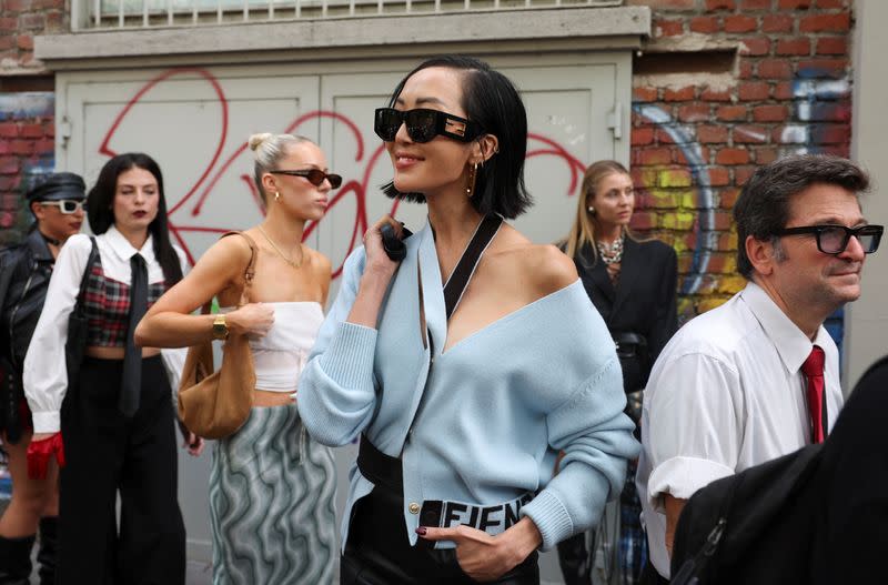 Street scenes at Milan Fashion Week Spring/Summer 2024