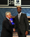 NEWARK, NJ - JUNE 28: Harrison Barnes (R) of North Carolina greets NBA Commissioner David Stern (L) after he was selected number seven overall by the Golden State Warriors during the first round of the 2012 NBA Draft at Prudential Center on June 28, 2012 in Newark, New Jersey. NOTE TO USER: User expressly acknowledges and agrees that, by downloading and/or using this Photograph, user is consenting to the terms and conditions of the Getty Images License Agreement. (Photo by Elsa/Getty Images)