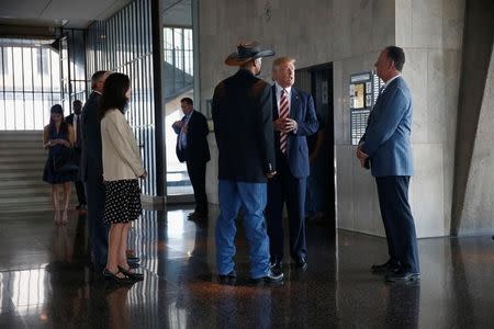 Republican U.S. presidential nominee Donald Trump visits the Milwaukee County War Memorial Center in Milwaukee, Wisconsin August 16, 2016. REUTERS/Eric Thayer