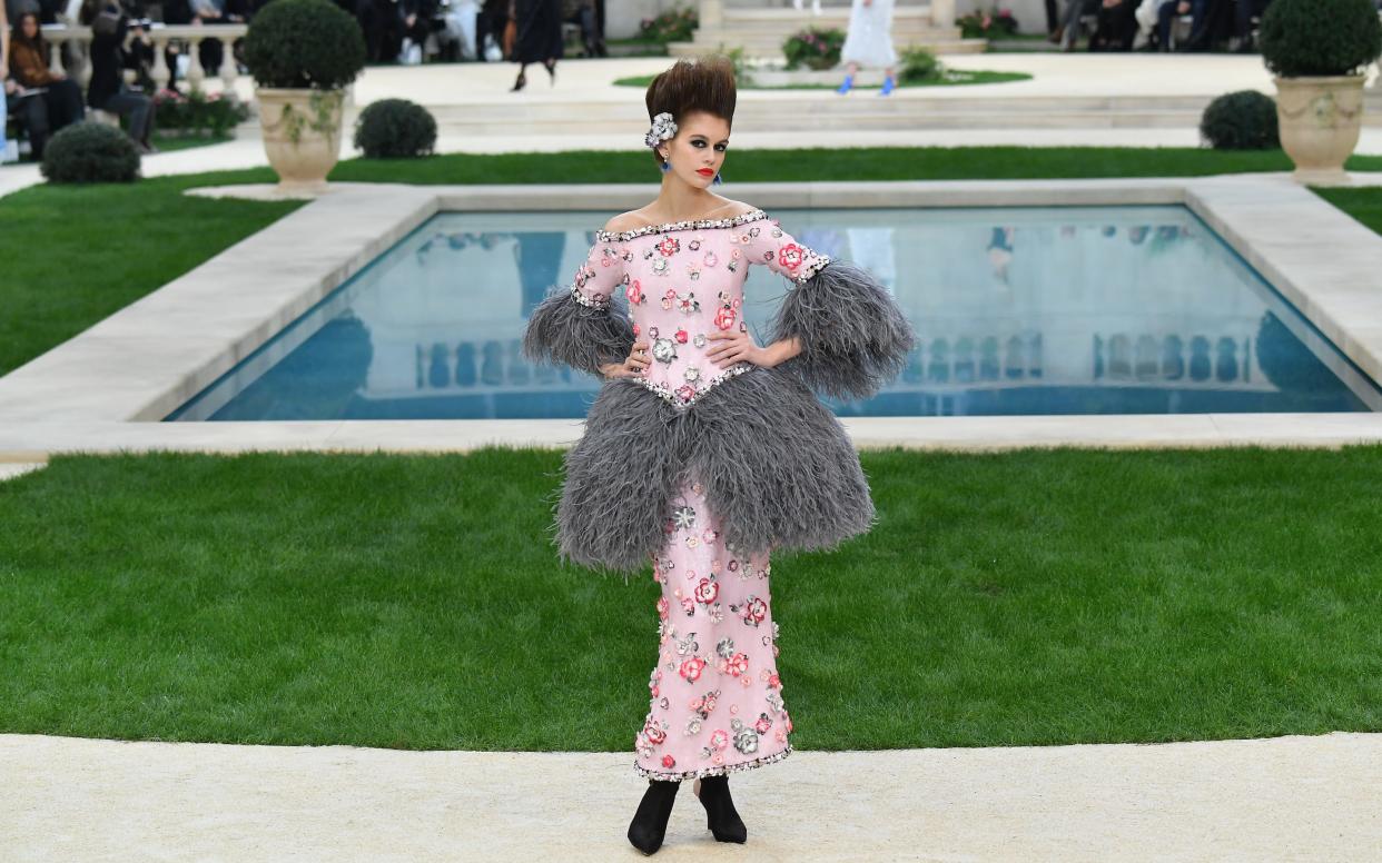 Feather-trimmed dress: Fantasy... Chic as anything. Reality... Lady who keeps chickens that may recently have been savaged by Fantastic Mr Fox.  - 2019 Stephane Cardinale - Corbis