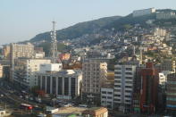 <p>A view of hilly Nagasaki neighborhoods from Nagasaki Station. (Photo: Michael Walsh/Yahoo News) </p>