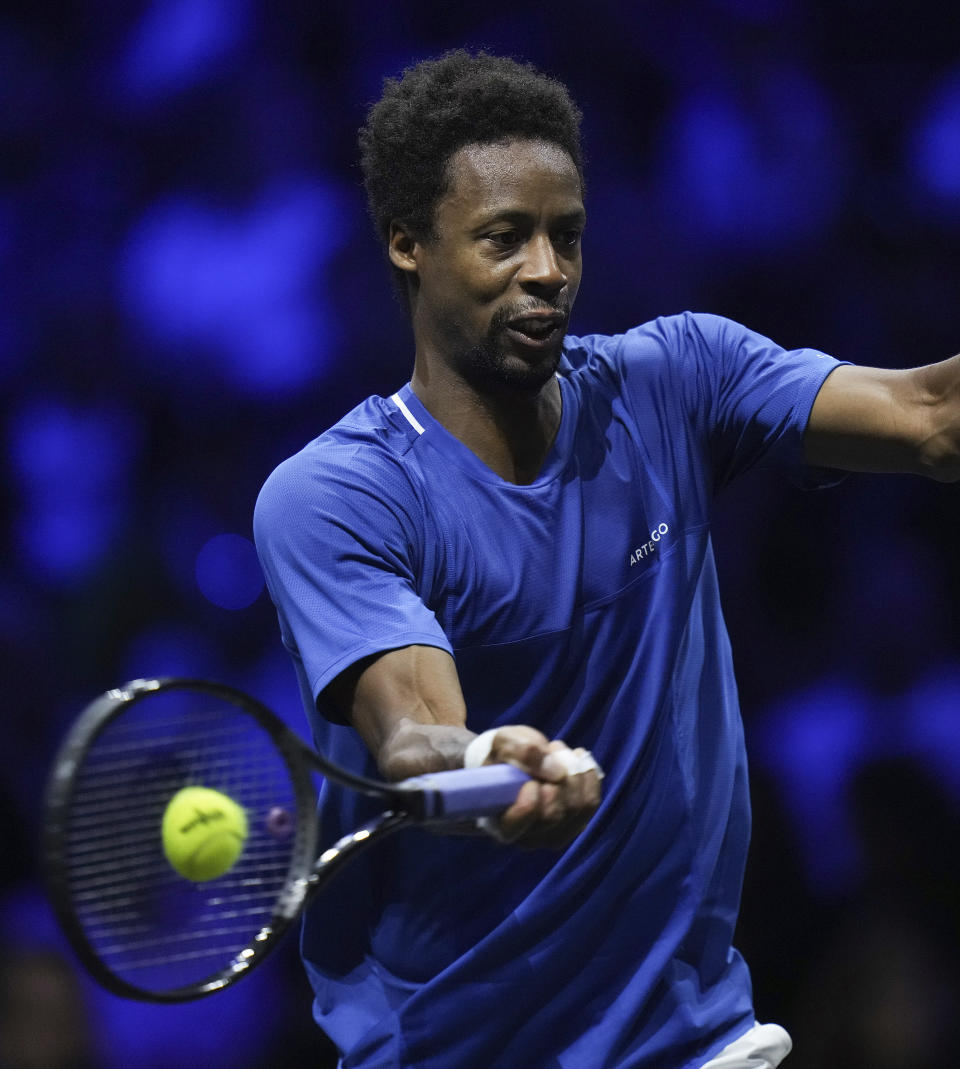 Team Europe's Gael Monfils returns to Team World's Felix Auger-Aliassime during a Laver Cup tennis match Friday, Sept. 22, 2023, in Vancouver, British Columbia. (Darryl Dyck/The Canadian Press via AP)