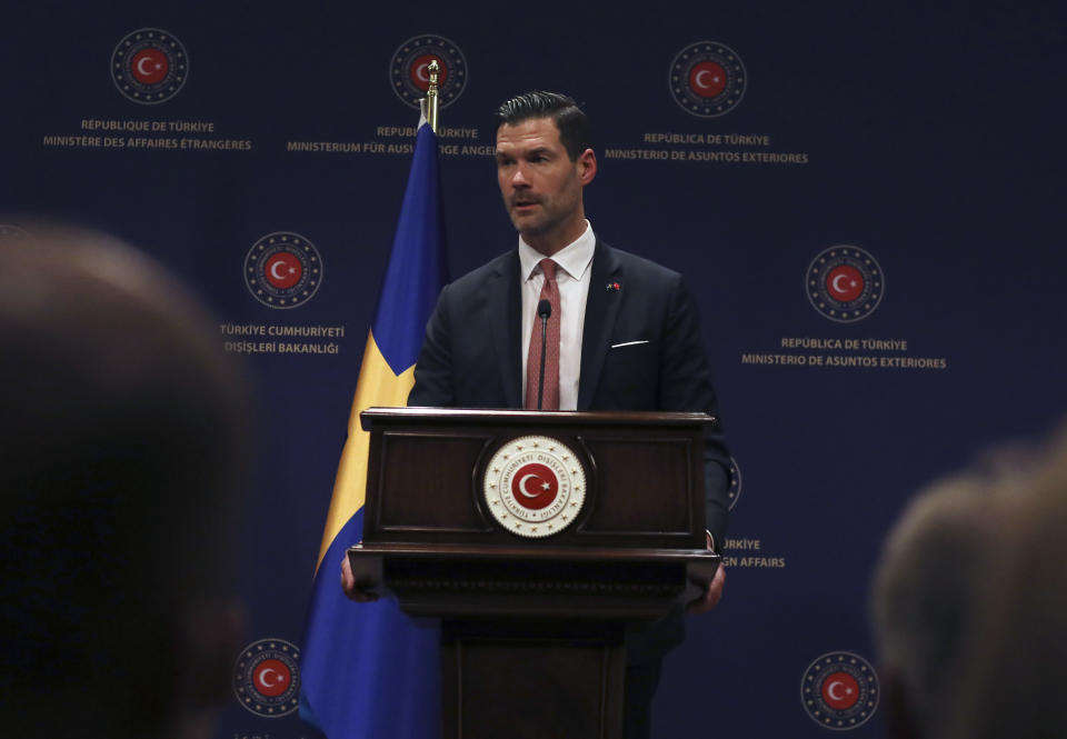 Sweden's Minister for International Development Cooperation and Foreign Trade Johan Forssell speaks at a joint news conference with Turkey's Foreign Minister Mevlut Cavusoglu and European Commissioner for Neighbourhood and Enlargement Oliver Varhelyi, in Ankara, Turkey, Wednesday, Feb. 22, 2023. Varhelyi and Forssell are in town to prepare for the International Donor's Conference, scheduled for March in Brussels, and aimed at mobilizing funds from the international community to support Turkey and Syria following the quakes.(AP Photo/Burhan Ozbilici)