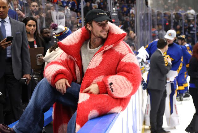 <p>Dave Sandford/NHLI via Getty </p> Justin Bieber watches the action at the 2024 Honda NHL All-Star Game in Toronto.