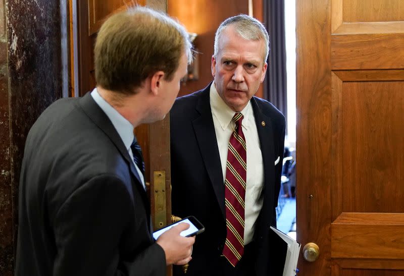 Senator Sullivan departs from a briefing on the corona virus outbreak in China in Washington