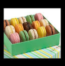 Box of Macaroons-<br>With their beautiful and delicate packaging, delightful texture, and assortment of delicious flavors, <a rel="nofollow noopener" href="http://www.shopsucre.com/macaroons/assorted-macaroons.html" target="_blank" data-ylk="slk:Sucre's macaroons;elm:context_link;itc:0;sec:content-canvas" class="link ">Sucre's macaroons</a> ($23) are to die for. If a guest showed up with a box of these macaroons, how could you not be happy?!