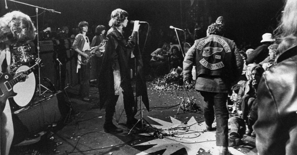 <p>AP </p> Mick Jagger sings next to a Hells Angels member at the Altamont Speedway on Dec. 6, 1969.