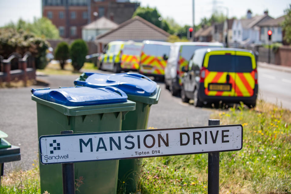 Police at the scene of the assault in Tipton, West Midlands.  May 28, 2020.  A woman is fighting for her life and a baby girl has suffered life threatening injuries following reports of an assault at a house. See SWNS story SWMDassault.  Emergency services rushed to the scene on The Leasowes, in Tipton, West Mids., after being called at around 12.30am today (Thurs).  The female victim was treated at the scene before taken to hospital in a critical condition.  The tot was also rushed to hospital for further treatment after suffering "potentially life-threatening injuries". 