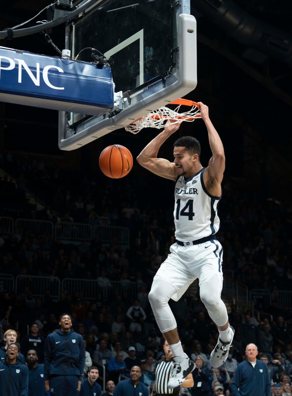 Butler Bulldogs guard Pierce Thomas (14) throws down a dunk Monday, Nov. 7, 2022, at Hinkle Fieldhouse in Indianapolis.