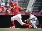 June 24, 2018; Anaheim, CA, USA; Los Angeles Angels first baseman Albert Pujols (5) reaches first on an error in the eighth inning against the Toronto Blue Jays at Angel Stadium of Anaheim. Mandatory Credit: Gary A. Vasquez-USA TODAY Sports