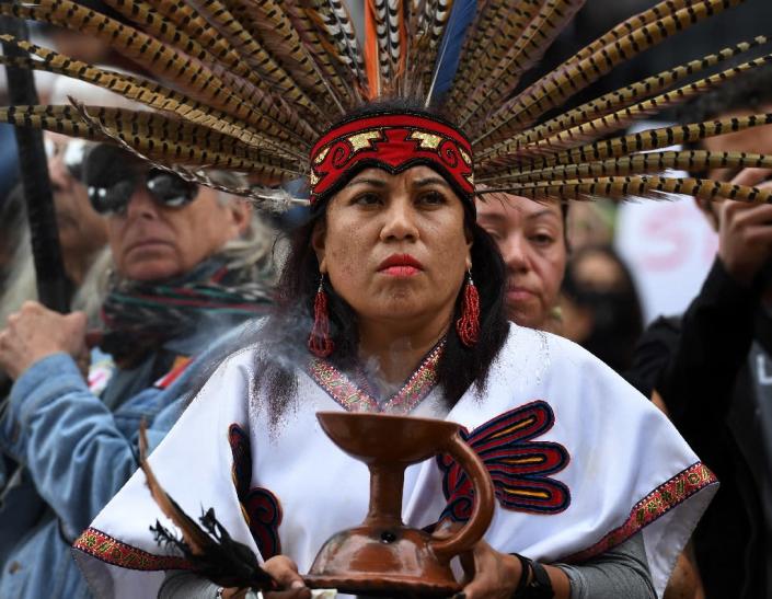 This photo taken on February 5, 2017 shows Native American and demonstrators marching to the Federal Building in Los Angeles in protest against President Donald Trump's executive order fast-tracking the Keystone XL and Dakota Access oil pipelines (AFP Photo/Mark RALSTON)