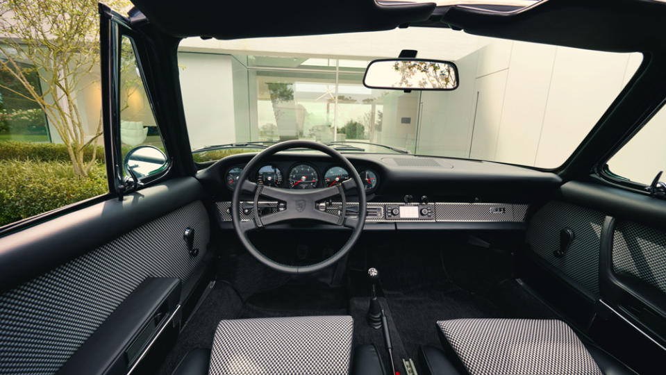 The retro Targa’s interior also pays respect to Porsche Design’s first timepiece while adding copious amounts of Pepita, the marque’s checkered fabric. - Credit: Photo: Courtesy of Porsche Design.