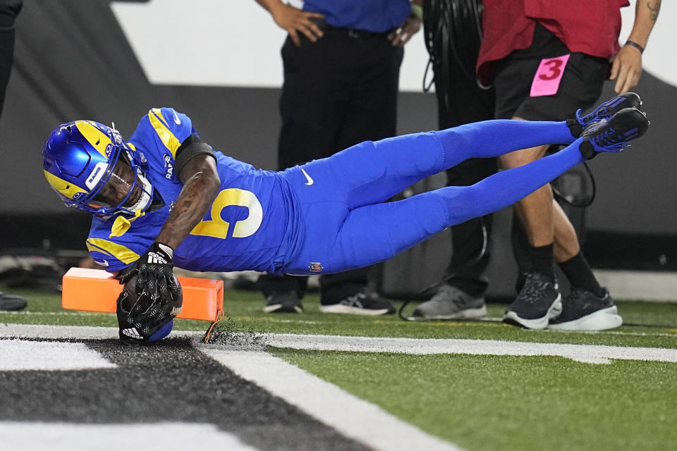 Los Angeles Rams wide receiver Tutu Atwell dives for the end zone during the first half of an NFL football game against the Cincinnati Bengals Monday, Sept. 25, 2023, in Cincinnati. The play was ruled a touchdown, but overturned on review. (AP Photo/Darron Cummings)