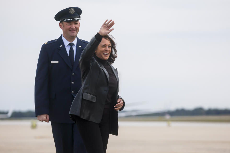 Vice President Kamala Harris waves as she departs for travel to Japan and South Korea from Joint Base Andrews, Maryland, Sunday Sept. 25, 2022. (Leah Millis/Pool via AP)