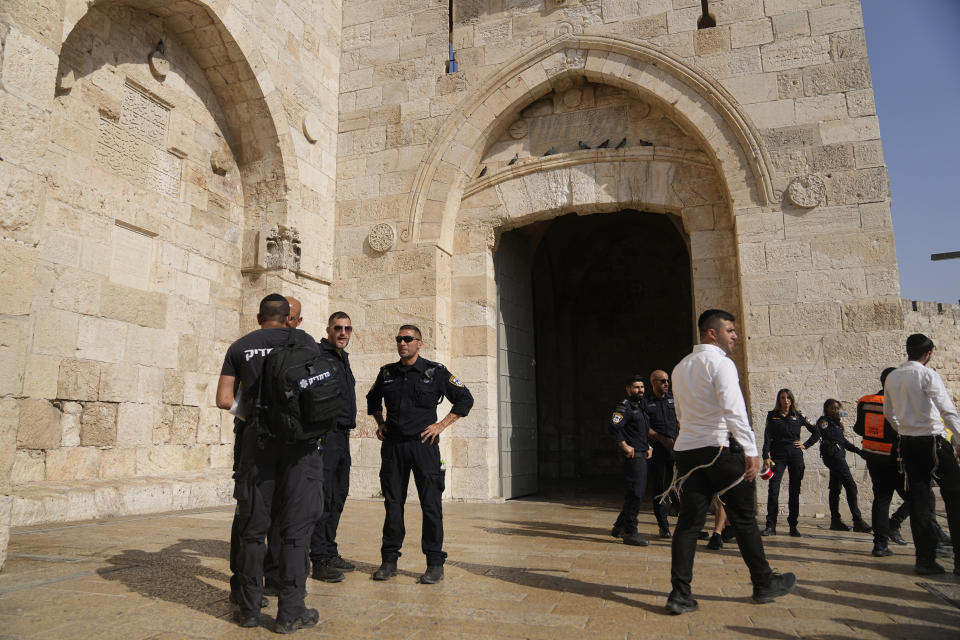 Israeli police inspect the scene of a Palestinian stabbing attack that wounded two people next to Jaffa Gate, just outside Jerusalem's Old City, Wednesday, Sept. 6, 2023. Israeli police said the attacker, 17-year-old Palestinian, was caught and arrested. (AP Photo/Ohad Zwigenberg)