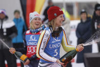 From left, second placed United States' Mikaela Shiffrin and the winner Germany's Lena Duerr celebrate after completing an alpine ski, women's World Cup slalom, in Spindleruv Mlyn, Czech Republic, Sunday, Jan. 29, 2023. (AP Photo/Giovanni Maria Pizzato)