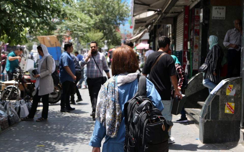 Women walking without headscarves on July 18 after the mortality police resumed hijab patrols